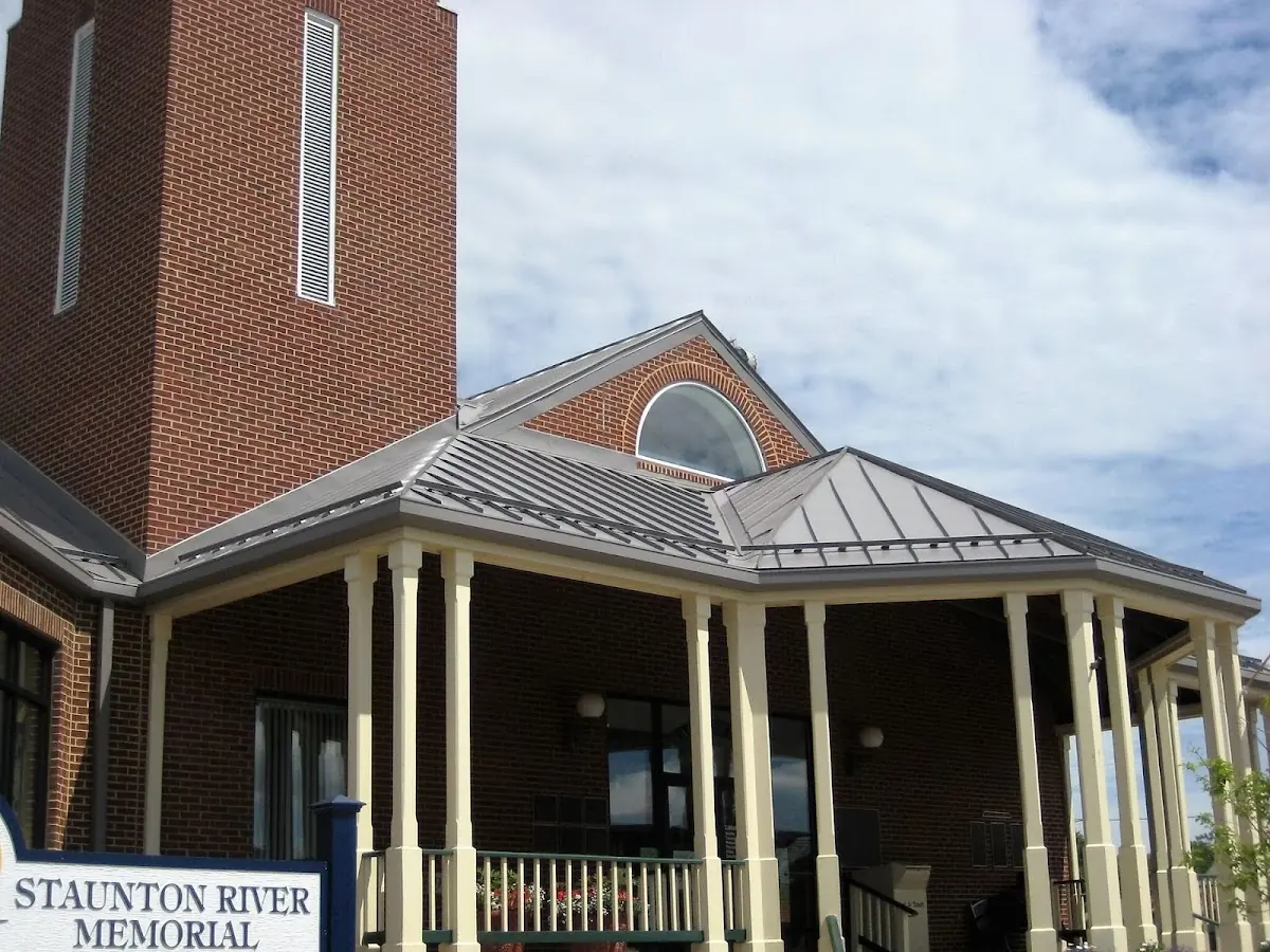 Skilled roofing craftsmen working on a residential roof in Bountiful